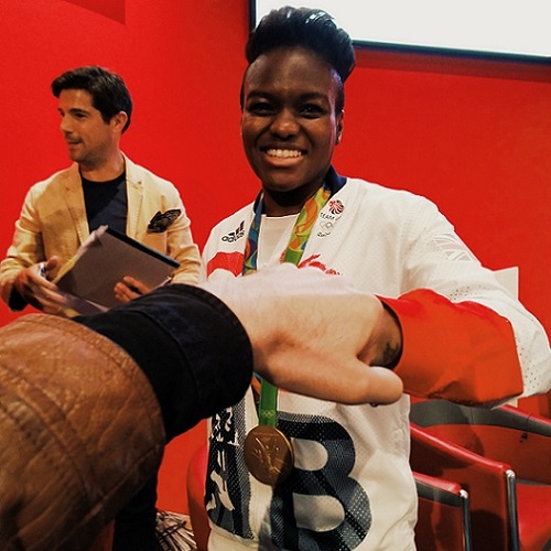 Fist bump with double Olympic gold medallist Nicola Adams photobombed by the guy from the Everest double glazing adverts.