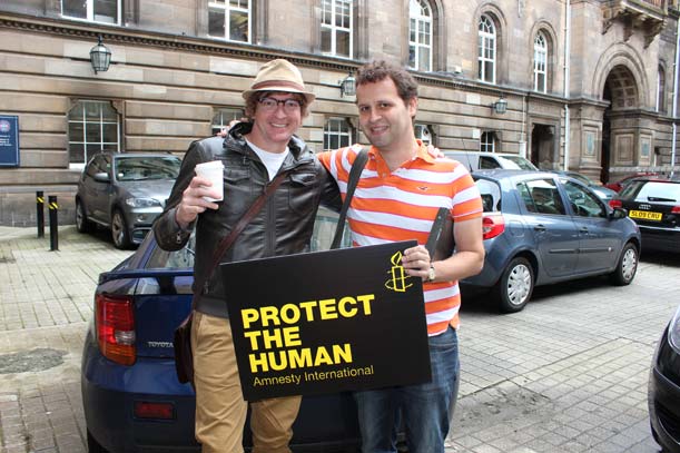 Adam Kay and Rhys Darby support Amnesty
