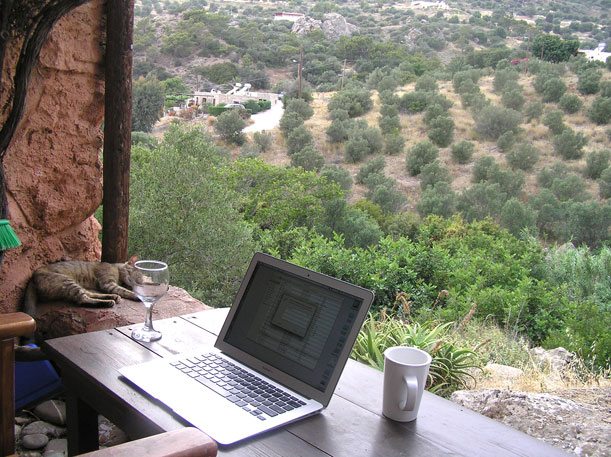 Working overlooking olive trees in Crete